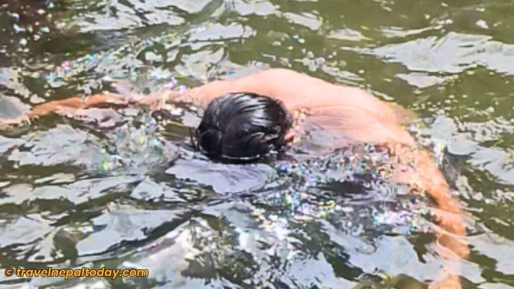 swimming in mailung waterfall