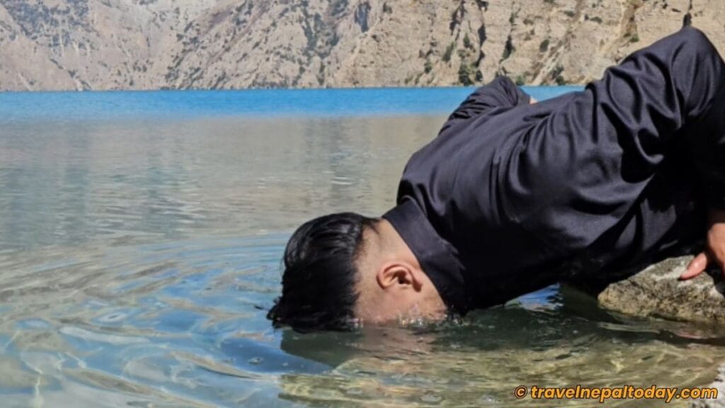 dipping head inside phoksundo lake
