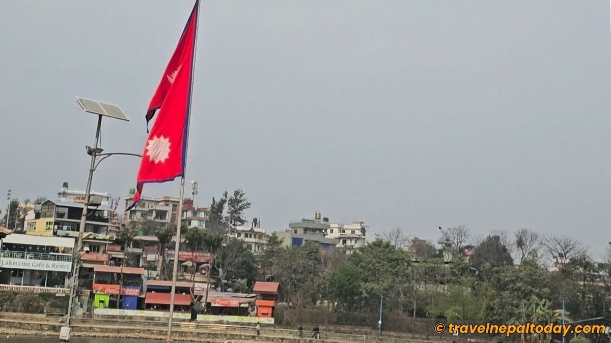 nepal flag in taudaha lake